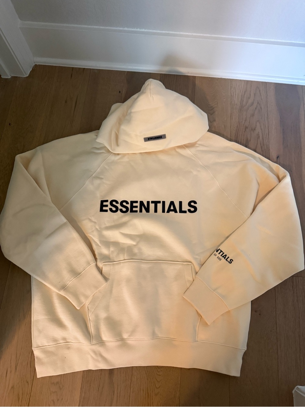 Essentials Pale Yellow Hoodie with Black Logo